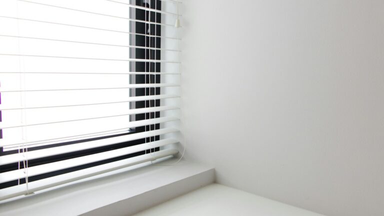 white blind in the window sill